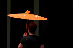 Woman with Orange Umbrella