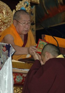 His Holiness Penor Rinpoche Blesses Sakyong Mipham, Photo by James Hoagland, Centre Productions