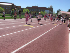 Children running on Earth Day in Boulder
