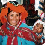 Woman and child in market in the Valle Sagrada, Sacred Valley, Peru; photo by Deborah Lafferty