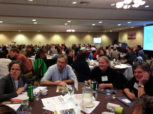 People talking during a “Table Talk” session at the Annual Vermont Farm to Plate Network Gathering in October, 2014. photo courtesy of Vermont Sustainable Jobs Fund, 2014